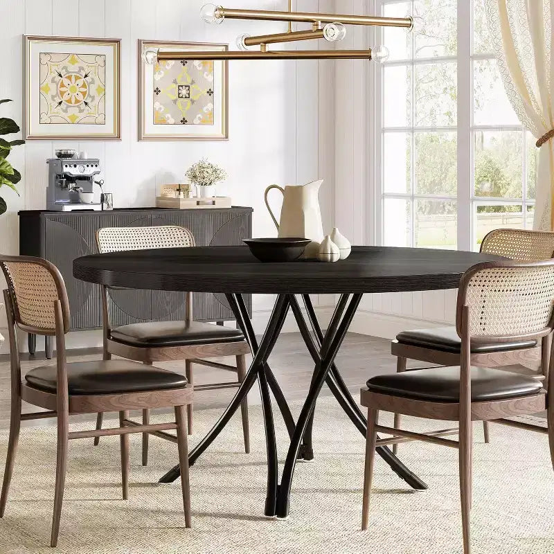 Tavolo da pranzo moderno rotondo da 120 cm per 4 persone, piano in legno nero con gambe in metallo incrociate